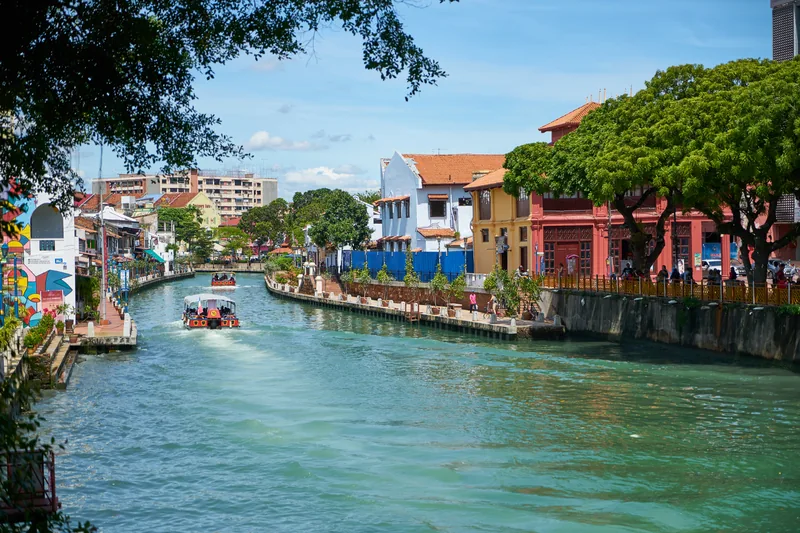 Melaka River beside colourful heritage buildings