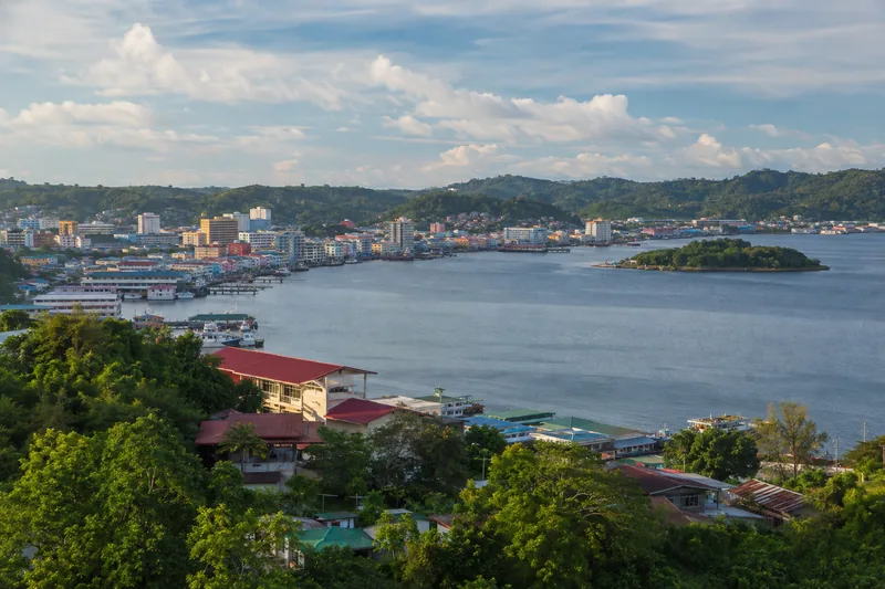 Promotional city visual representing Sandakan, Sabah.